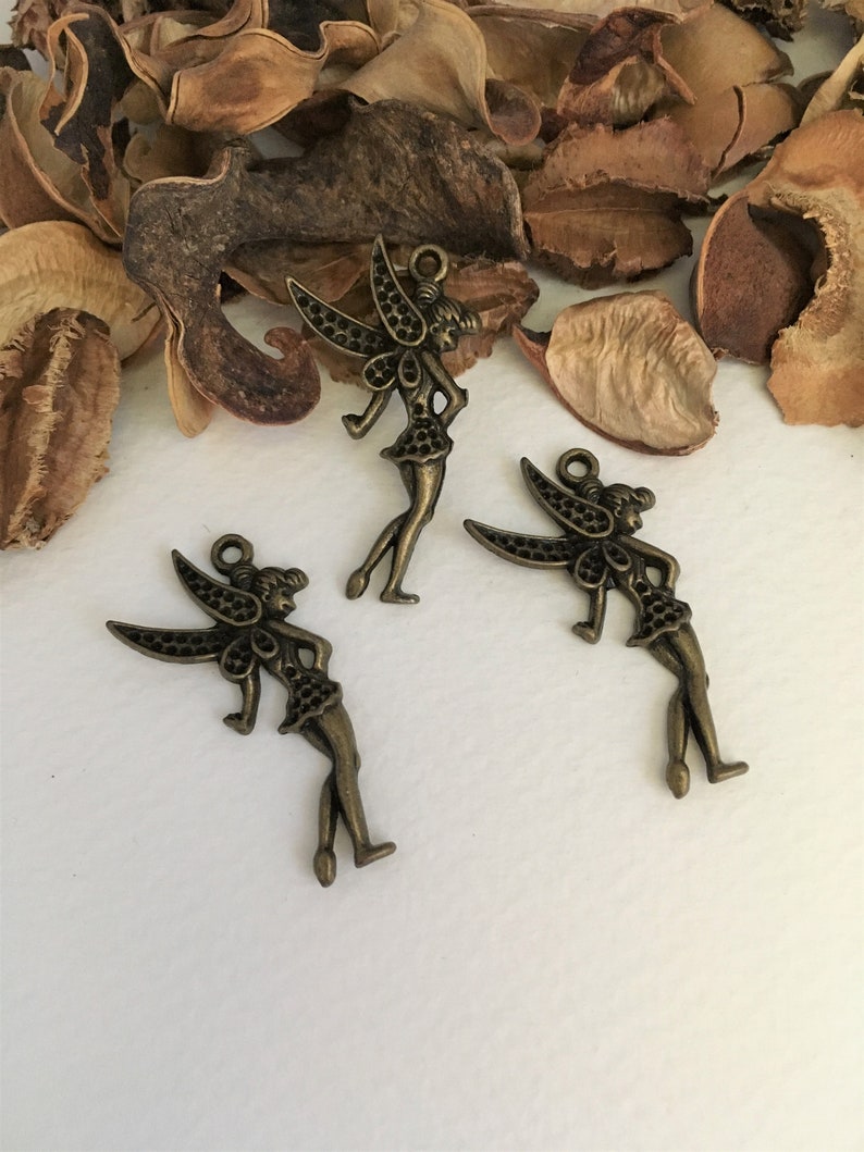 124 charm pendants Tinkerbell bronze color with holes for rhinestones