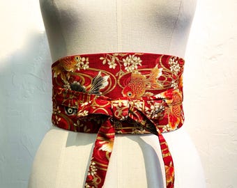 Reversible and adjustable Obi belt in Japanese printed cotton with a gold gold fish motif on a red background and solid mustard red or black, high waist