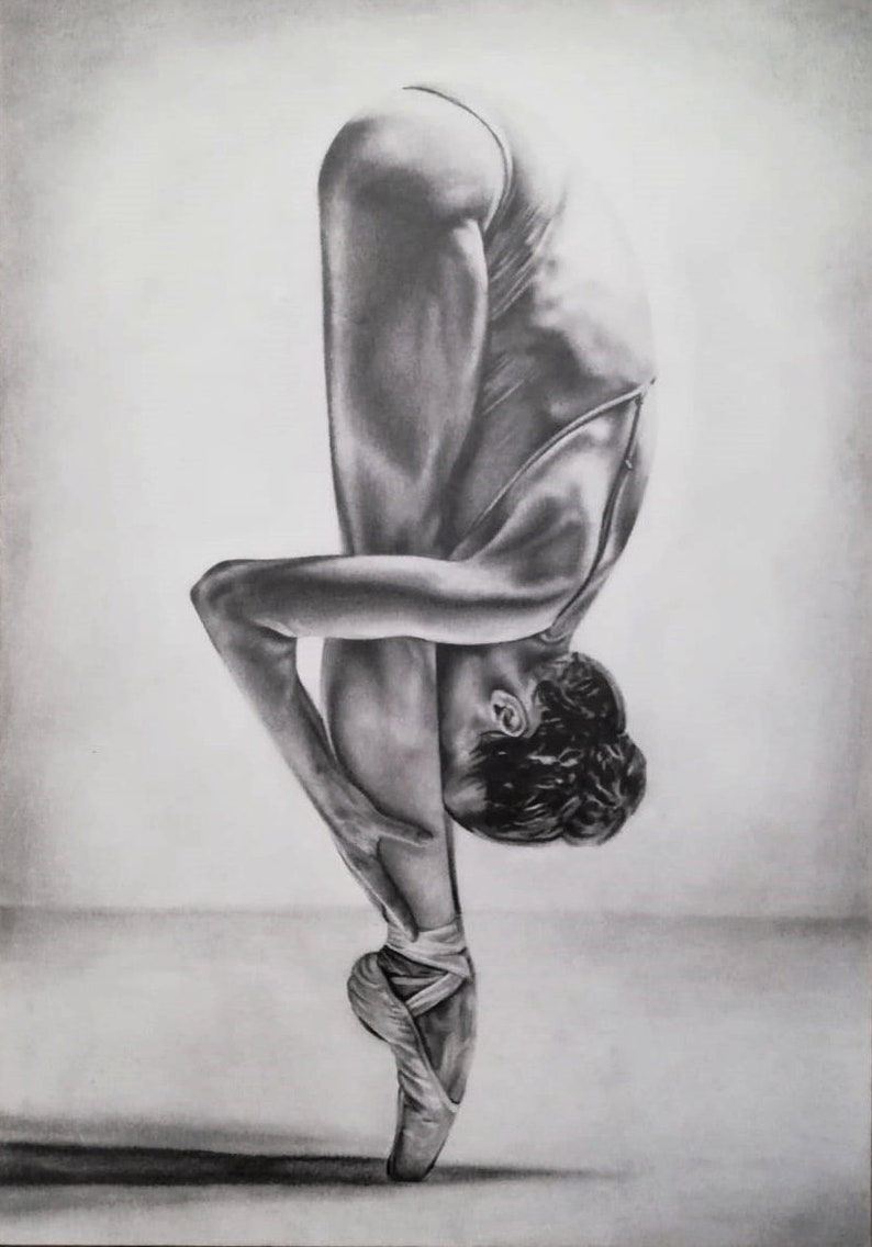 May include: A black and white pencil drawing of a ballerina in a pointe shoe, bending over with her head touching her toes.