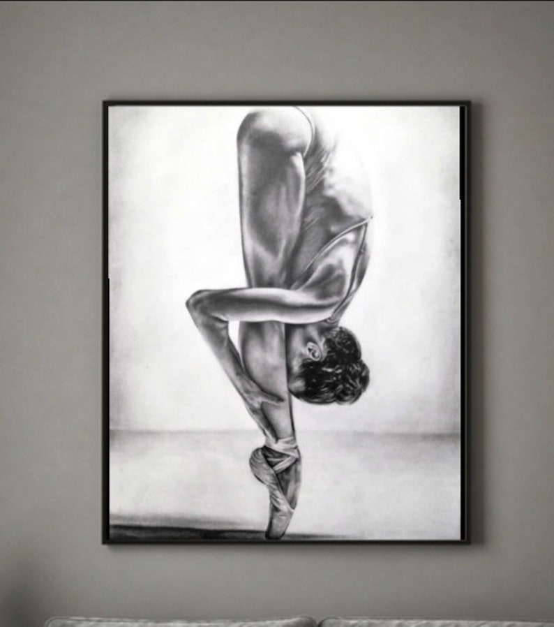 May include: A black and white pencil drawing of a ballerina in a pointe shoe, standing on one leg and bending over with her other leg extended behind her.