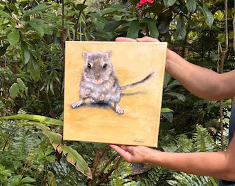 May include: A painting of a small, grey gerbil on a yellow background. The gerbil is looking directly at the viewer with its front paws raised.