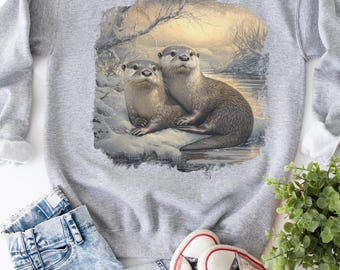 Felpa retrò anni '90 con lontre di fiume, girocollo vintage con animali selvatici invernali, pullover unisex, maglietta con animali con scena innevata, regalo rustico per gli amanti degli animali