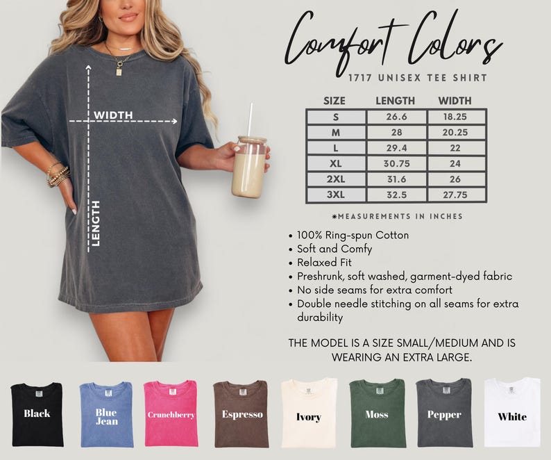 May include: A woman wearing a dark gray Comfort Colors 1717 unisex tee shirt. The image includes a size chart with measurements in inches, and color options: black, blue jean, crunchberry, espresso, ivory, moss, pepper, and white.