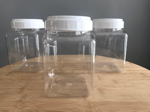 Does anyone know where to get 8oz containers that look like the photos?  where the screwy bit doesn't interfere with the container and so I don't  have to use my fingernail to