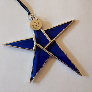Stained Glass Star Suncatcher: 5.25&quot; Wishing Star Decor