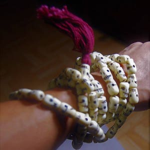 TIBETAN yogi bone carved skeleton mala 108 skull beads.