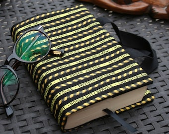 Cloth paperback book cover with yellow stripes Police Crime Scene