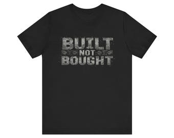 Camiseta de mecánico grunge de acero remachado "Construido, no comprado"