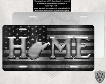 May include: A black and white metal license plate with the word "HOME" in large, silver letters. The letters are superimposed over a stylized American flag design with a silver outline of the state of West Virginia.