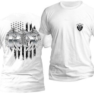 May include: White t-shirt with a distressed American flag design and a silver 'RN' with a medical caduceus symbol and wings. The back of the shirt has a small silver shield with a symbol.