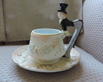 Bisque Tea Cup and Saucer Victorian Gentleman Figural Rare