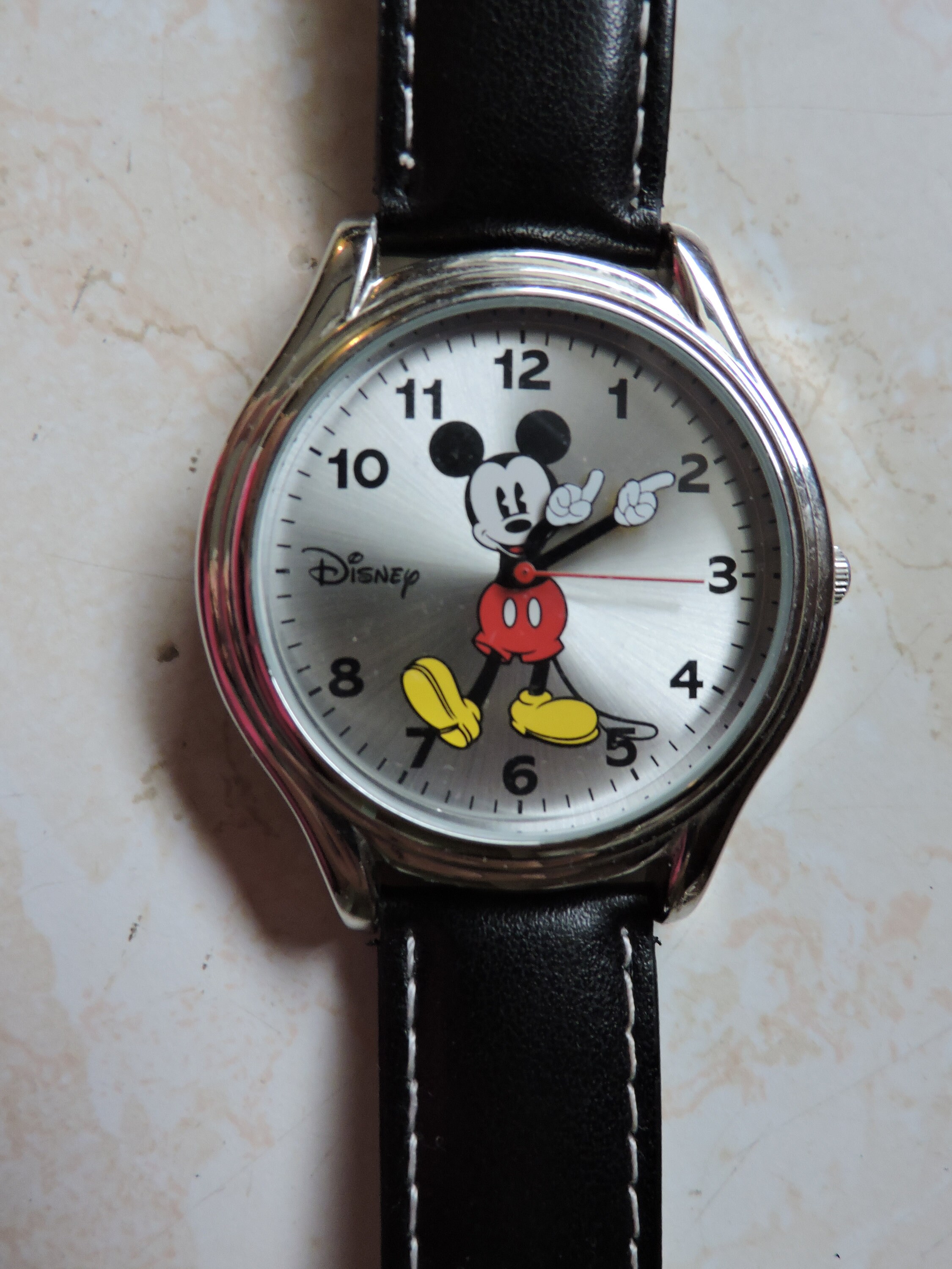 Mickey mouse watch with moving hands hotsell
