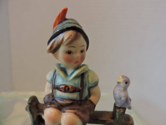 hummel boy with bird