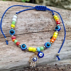 Good Luck 7 African Powers Adjustable Bracelet ~ Pulsera de Buena Suerte 7 Potencias Africanas Contra Mal de Ojo - Santeria Ifa Chango
