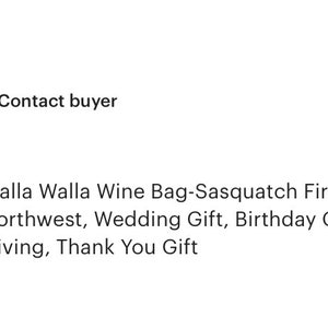 May include: A white canvas wine bag with a black silhouette of a Sasquatch and the text "Sasquatch Fire Water" printed on it. The bag measures 14 inches by 6 inches.