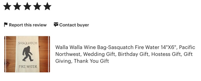 May include: A white canvas wine bag with a black silhouette of a Sasquatch and the text "Sasquatch Fire Water" printed on it. The bag measures 14 inches by 6 inches.