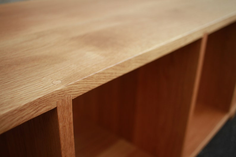 Solid white oak vinyl LP storage bench. Warner Bench.  Handcrafted furniture by Tomfoolery Wood Co.