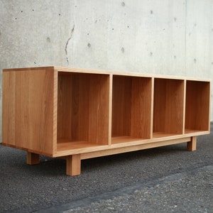 Solid white oak vinyl LP storage bench. Warner Bench.  Handcrafted furniture by Tomfoolery Wood Co.