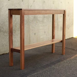 Mesa de recibidor Warner, mesa de entrada moderna, mesa de consola moderna, mesa de entrada rectangular de madera (mostrada en nogal)