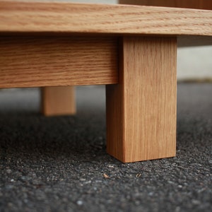 Solid white oak vinyl LP storage bench. Warner Bench.  Handcrafted furniture by Tomfoolery Wood Co.