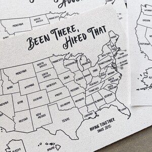 May include: A black and white outline map of the United States with the text "Been There, Hiked That" and "Hiking Together Since 2015" printed on the map.