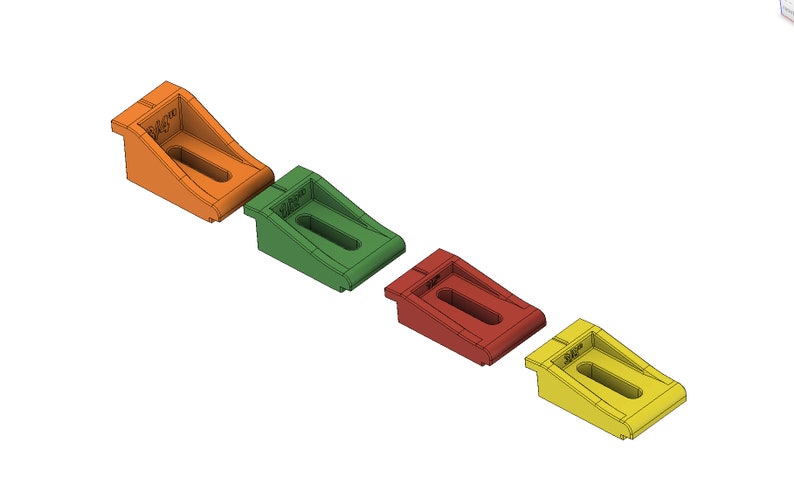 May include: Four plastic corner brackets in different colors: orange, green, red, and yellow. Each bracket has a slot for a screw and the text "3/4" x 3/4" printed on it.