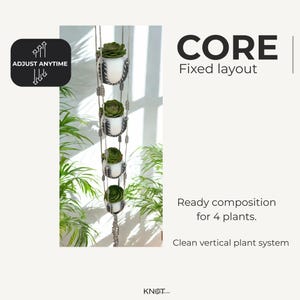 May include: A vertical plant system with four white ceramic pots, each holding a green succulent. The pots are suspended by a macrame rope. The text "CORE Fixed layout" is displayed. The text "ADJUST ANYTIME" is also displayed.