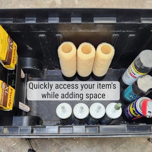 May include: A black plastic tool organizer filled with painting supplies. Includes paint roller refills, spray paint cans, and paint cans. The text on the image reads: "Quickly access your item's while adding space."