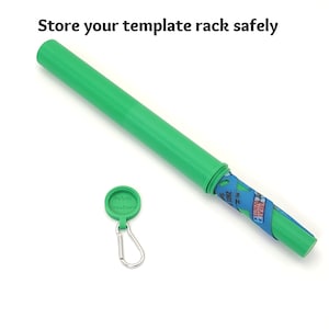 May include: A bright green cylindrical storage tube with a matching screw-on cap featuring a small metal carabiner. The text "Store your template rack safely" is printed above the tube, and a blue patterned template is visible inside.