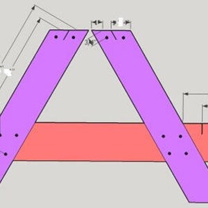 May include: Diagram showing how to build a wooden table with two purple legs and a red top. The legs are 17 1/2 inches long and the top is 3/4 inches thick.