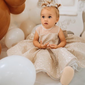 infant gold holiday dress Bébé Glitz Tutu Dress Linen / 0-3 Months / Shell: (Knitted Fabric 100% Cotton, Net Fabric 100% Nylon) Lining: (Woven Fabric 100% cotton) Exclusive of main image 1