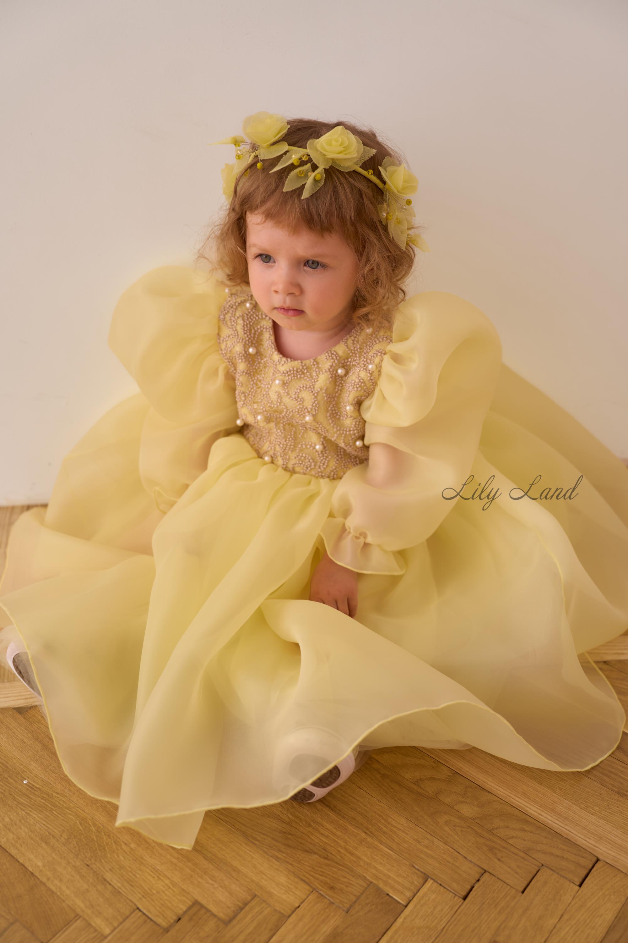strapless open back dress Bronwyn Bow-Detail Pleated Mini Dress in Pastel Yellow