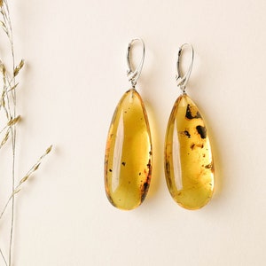 Large amber insects earrings, green oval thick amber earrings with bits inside, amber with mosquitoes, fossil amber earrings, resin jewelry