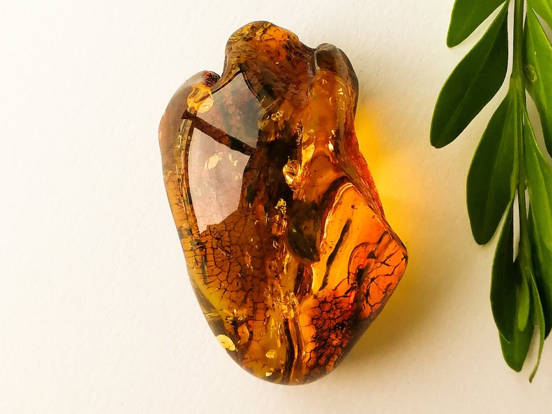 Exclusive amber stone with skin souvenir memento huge cognac color amber spiritual gift home Clear and shiny golden amber stone decoration