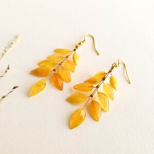 Light wire light yellow amber earrings, flower leaf earrings, butterscotch amber and brass gold plated, milky long amber earrings for her image 7