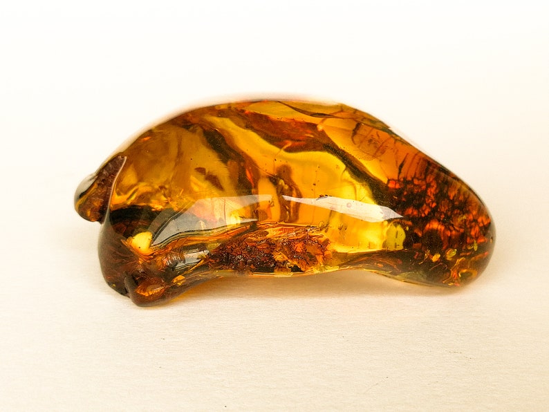 Exclusive amber stone with skin souvenir memento huge cognac color amber spiritual gift home Clear and shiny golden amber stone decoration