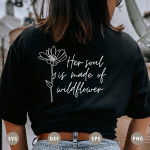 May include: Black t-shirt with a white outline of a flower and the text "Her soul is made of wildflower".