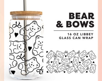 May include: A black and white design featuring a repeating pattern of gummy bears with bows and hearts. The design is printed on a clear glass can with a wooden lid. The text "BEAR & BOWS 16 OZ LIBBEY GLASS CAN WRAP" is printed below the image.