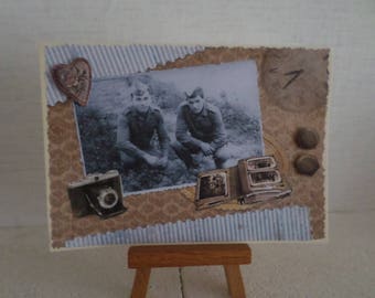 vintage with two men, a camera, photo album