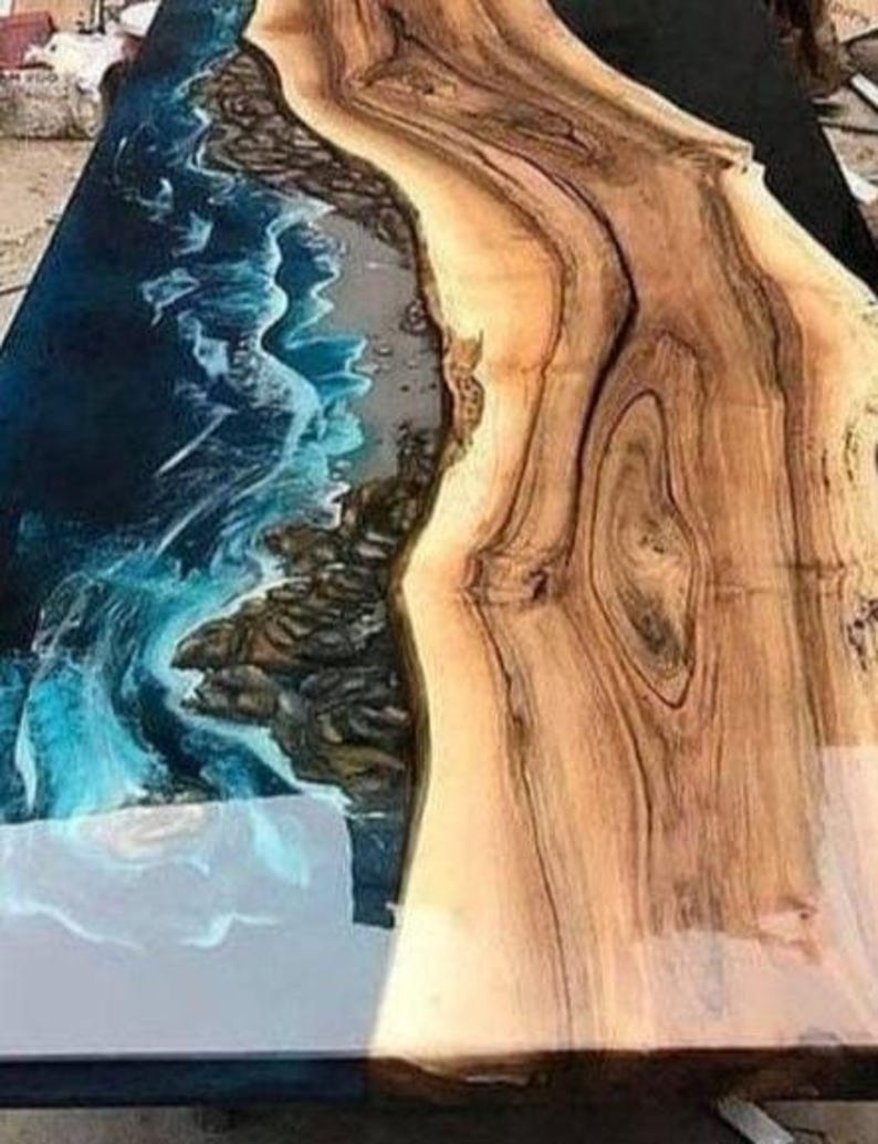 modern resin art wooden furniture

handcrafted epoxy wooden slab table

custom resin ocean table design