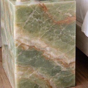Natural gemstone nightstand with lamp and flower vase