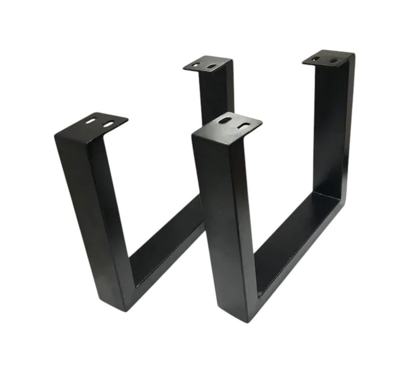 May include: Two black metal table legs in a U-shape. Each leg has a flat top with pre-drilled holes for easy attachment. The legs are made of sturdy metal and are designed to support a tabletop. The legs are a modern design.