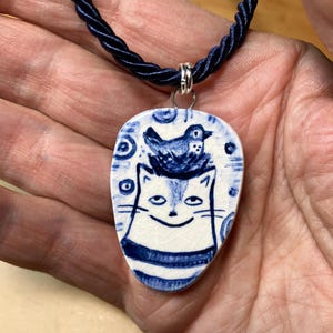 One of a kind, Bird Brain Cat Pendant/Necklace. Hand painted ceramic. 16&quot; - 18&quot; adjustable cord.
