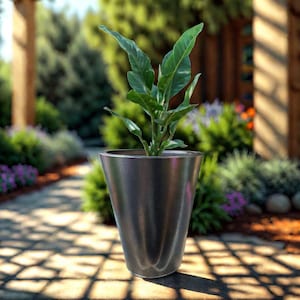 May include: A dark grey, textured, tapered planter with a green plant inside. The planter is sitting on a stone path.