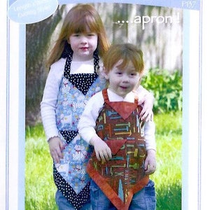 May include: Two children wearing colourful aprons with a variety of patterns. The girl is wearing a blue and white apron with black polka dots. The boy is wearing a brown and orange apron with a tool pattern. The image is from a sewing pattern for kids' aprons.