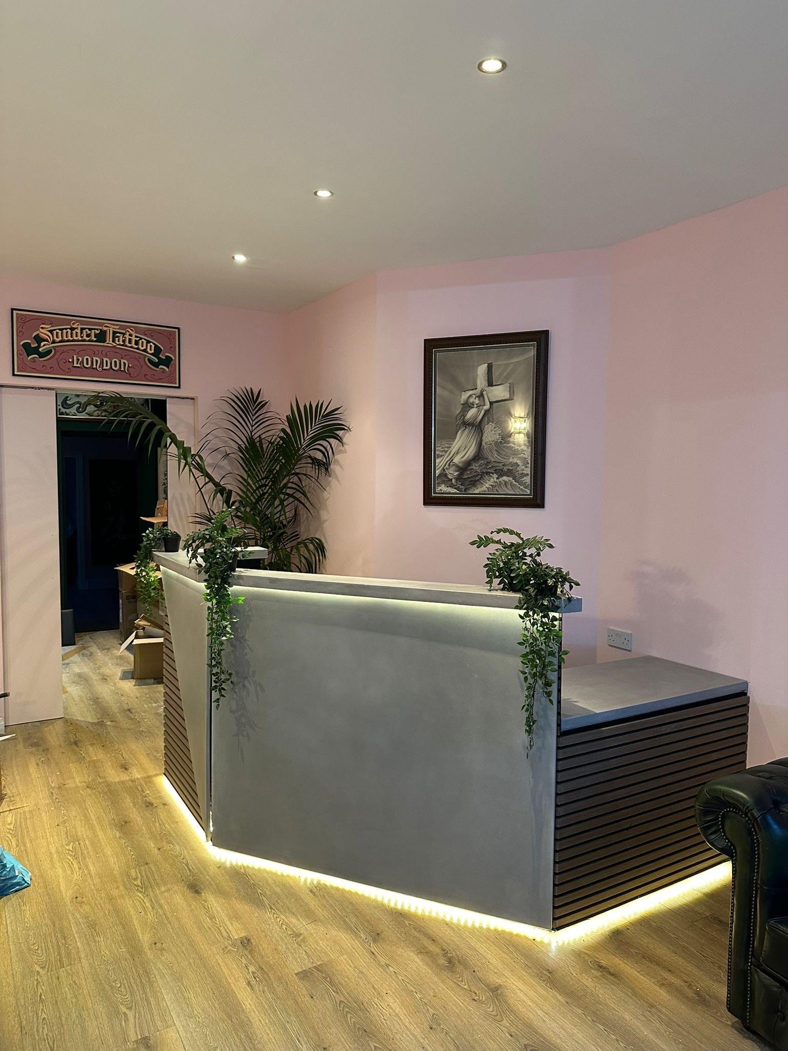 Custom concrete reception front desk.