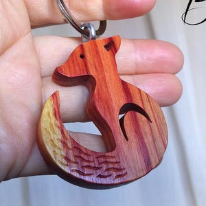 Little Wolf wooden keychain handmade by Ehlyass