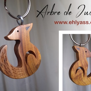 Handmade Little Wolf wooden keyring by Ehlyass