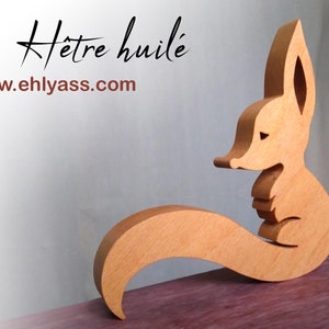 Handgefertigte Fuchsskulptur aus Holz von Ehlyass
