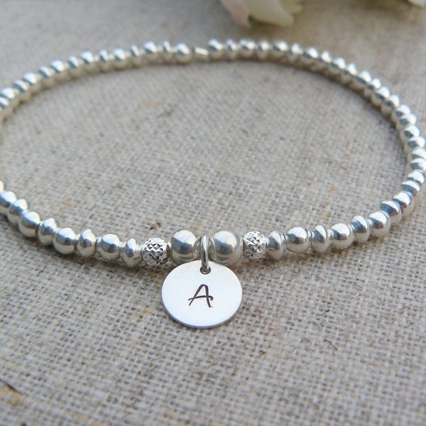 925 silver elastic bracelet with silver beads, one, two or three engraved initial medallions, customizable